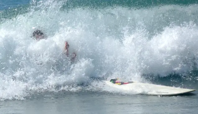 falling off a surfboard